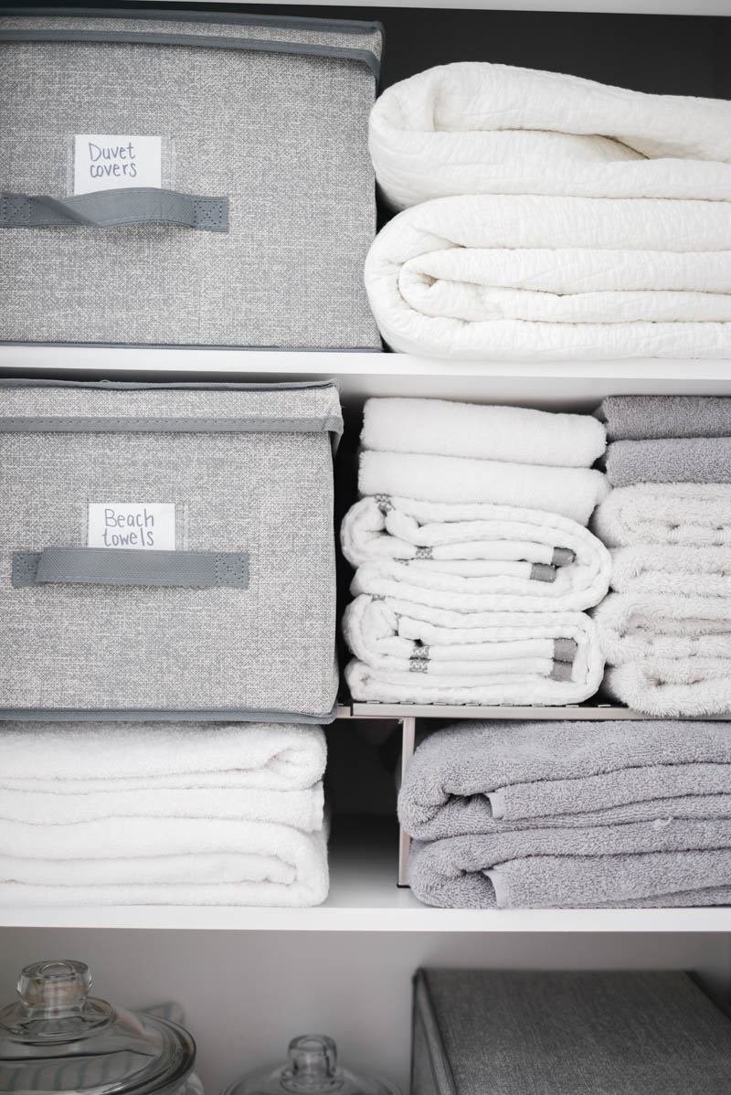 learner observer linen closet organizing folded towels