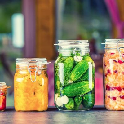Canning. Preserving. Pickles jars. Jars with pickles, pumpkin dip, white cabbage.