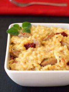 creamy risotto with sausage in a bowl