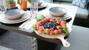 melamine cheese board with strawberries and blueberries