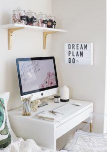 white letter box wall mounted with the phrase "dream plan do"
