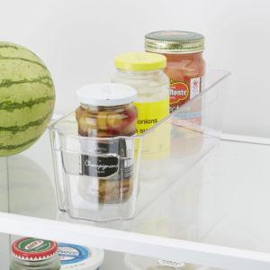 small clear container with condiments